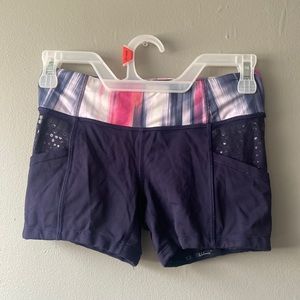 Navy blue lulu lemon athletic shirts